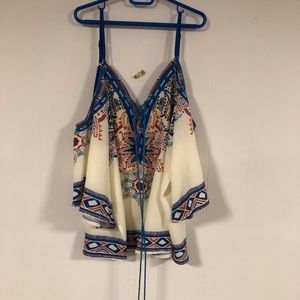 Cold shoulder top with tassel ties